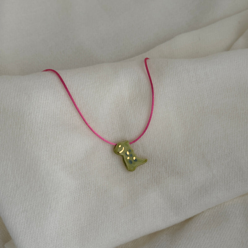 Colar Difusor Infantil de Óleo Essencial no Formato Dinossauro