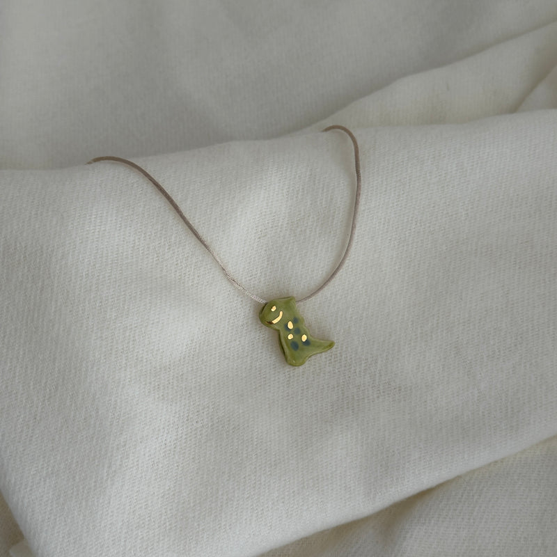 Colar Difusor Infantil de Óleo Essencial no Formato Dinossauro