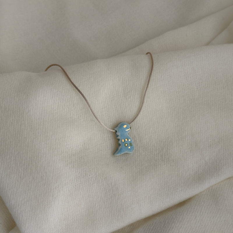 Colar Difusor Infantil de Óleo Essencial no Formato Dinossauro