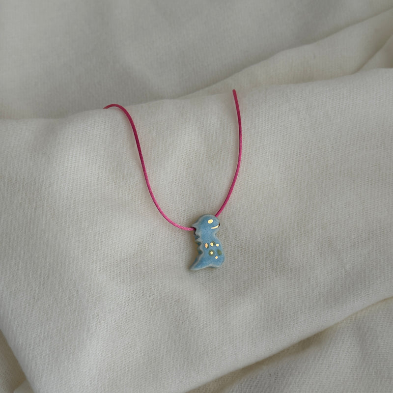 Colar Difusor Infantil de Óleo Essencial no Formato Dinossauro