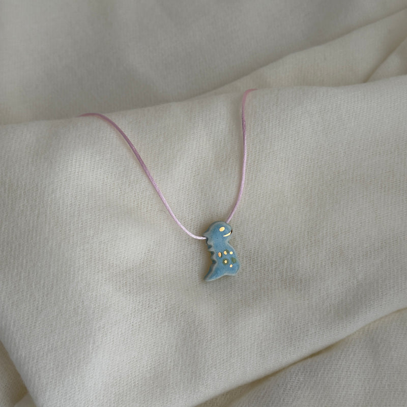 Colar Difusor Infantil de Óleo Essencial no Formato Dinossauro