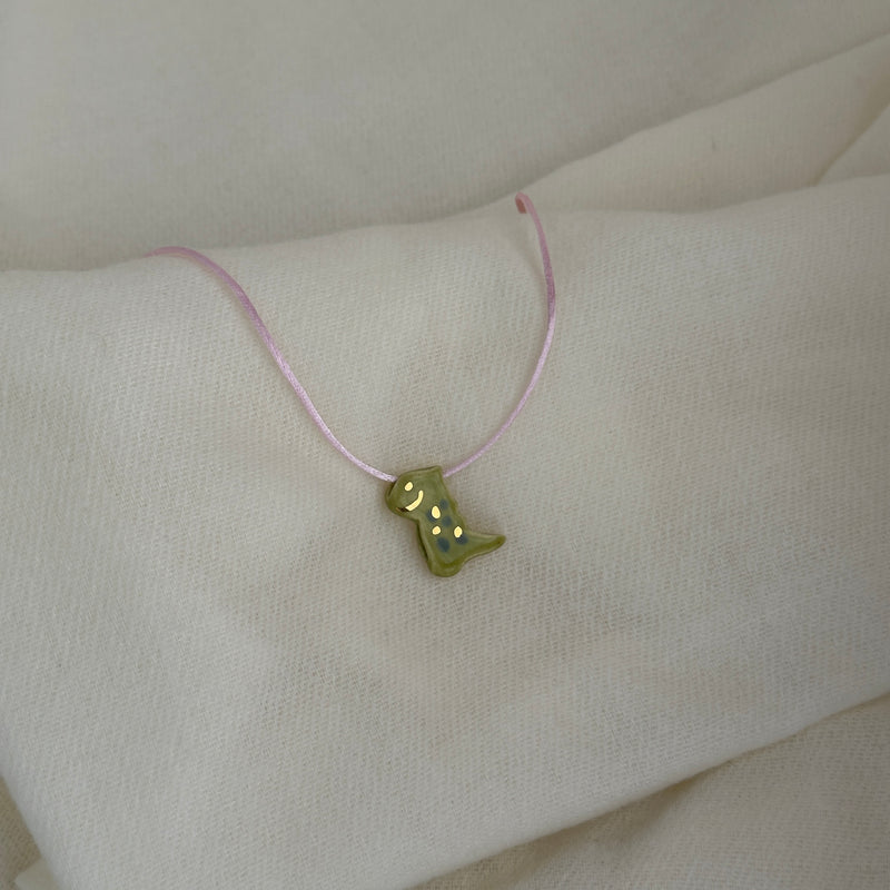 Colar Difusor Infantil de Óleo Essencial no Formato Dinossauro